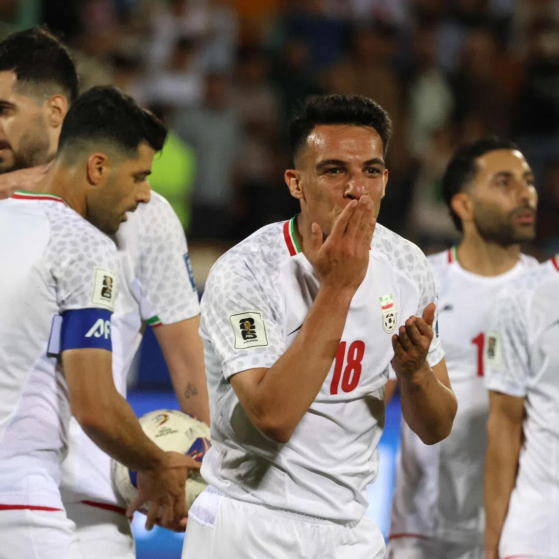 Iran midfielder Amirhossein Hosseinzadeh celebrates scoring his team's third goal during the 3-0 2026 World Cup qualifiying win over North Korea at the Azadi Sports Complex in Tehran on June 10, 2025. 
