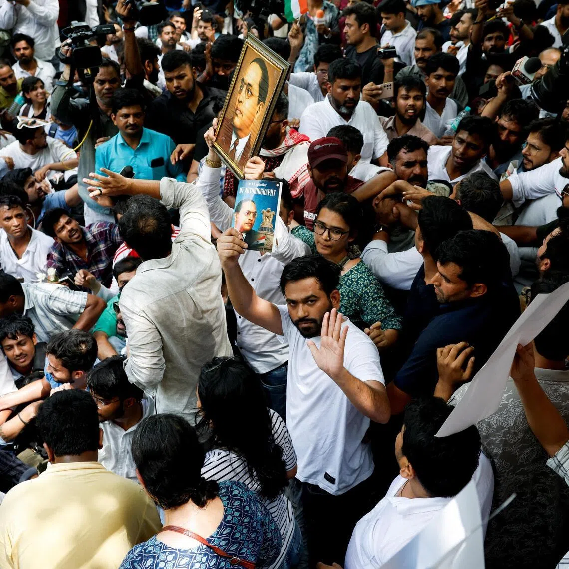 Cockroach Janta Party founder Abhijeet Dipke at a protest in New Delhi on June 6 demanding the resignation of Indian Education Minister Dharmendra Pradhan.