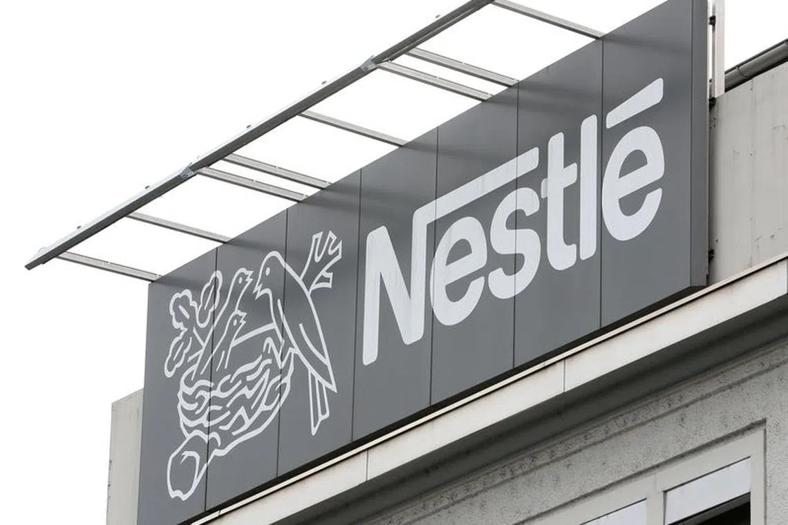 FILE PHOTO: Nestle's logo is seen at a plant in Konolfingen, Switzerland, Sept. 28, 2020. REUTERS/Arnd Wiegmann/File Photo