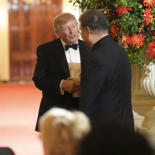 US President Donald Trump with Chinese President Xi Jinping during a state dinner at the White House on Sept 24.