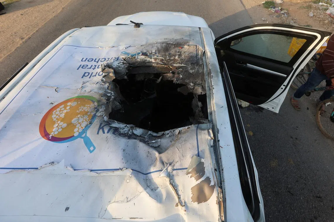 FILE PHOTO: A view of the destroyed roof of a vehicle where employees from the World Central Kitchen (WCK), including foreigners, were killed in an Israeli airstrike, according to the NGO as the Israeli military said it was conducting a thorough review at the highest levels to understand the circumstances of this \"tragic\" incident, amid the ongoing conflict between Israel and Hamas, in Deir Al-Balah, in the central Gaza, Strip April 2, 2024. REUTERS/Ahmed Zakot/File Photo