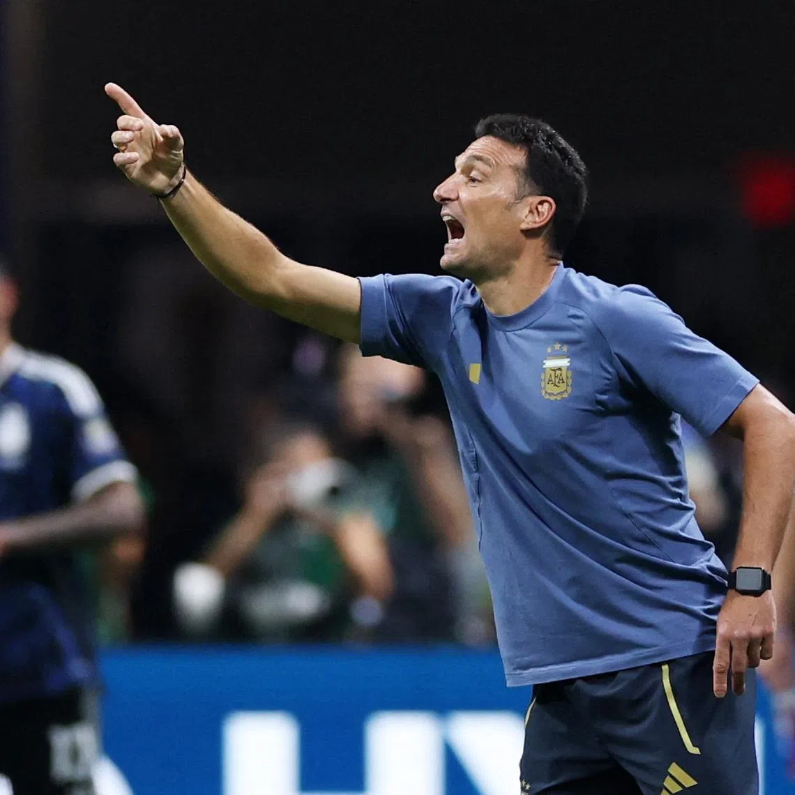 Soccer Football - FIFA World Cup 2026 - Semi Final - England v Argentina - Atlanta Stadium, Atlanta, Georgia, U.S. - July 15, 2026 Argentina coach Lionel Scaloni celebrates after Lautaro Martinez scores their second goal REUTERS/Paul Childs