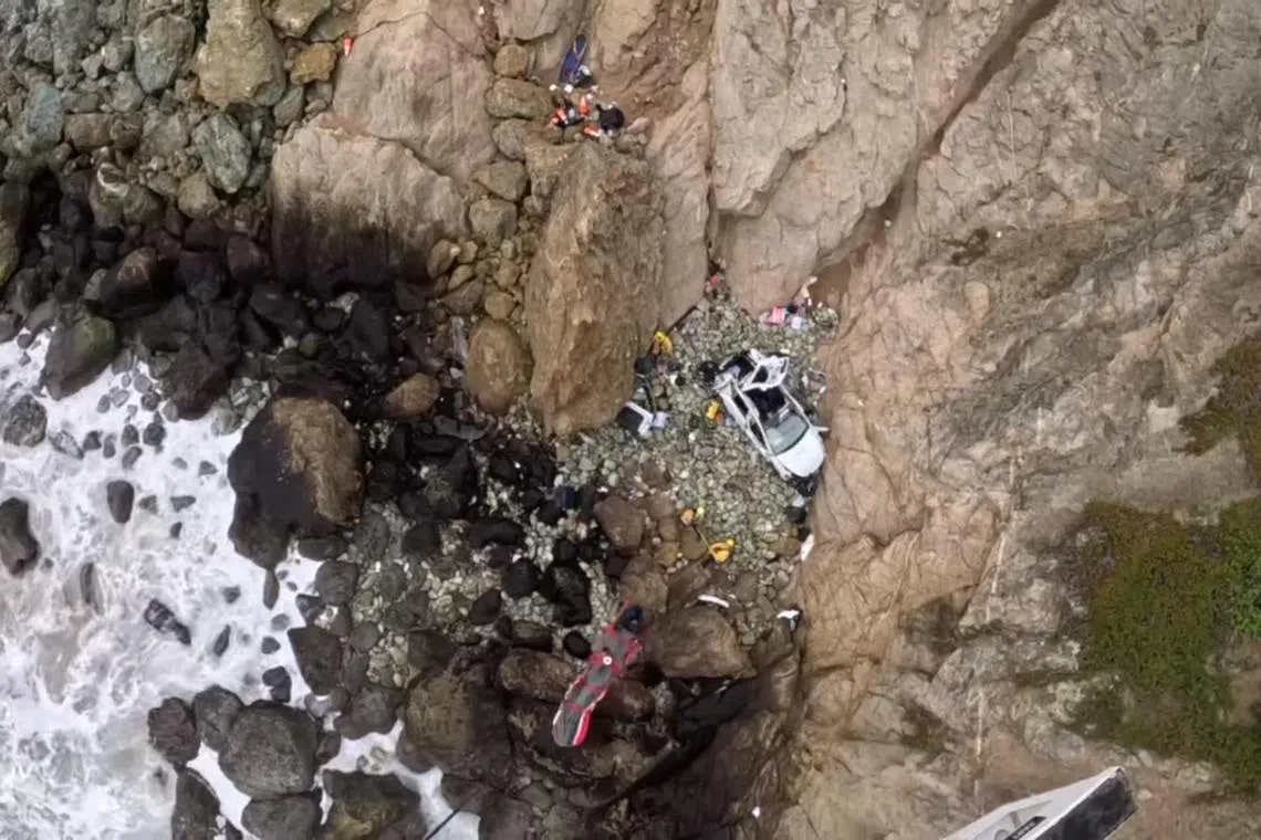 A crash victim is lifted from the scene to a helicopter, after the California crash, on Jan 2, 2023.