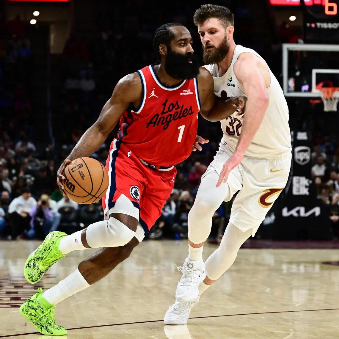 Los Angeles Clippers guard James Harden drives to the basket against Cleveland Cavaliers forward Dean Wade during the second half at Rocket Arena.