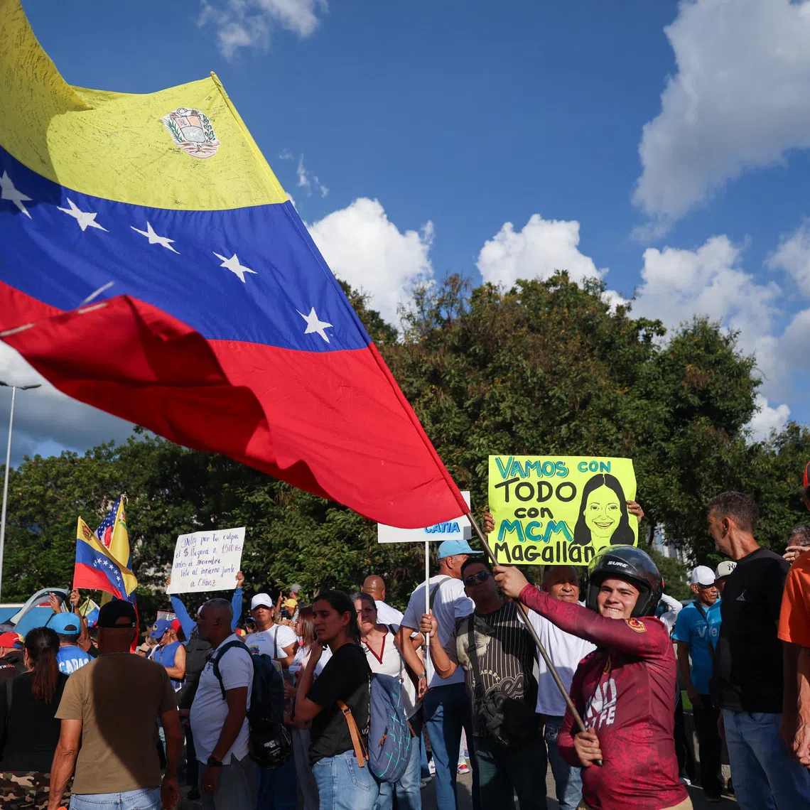 Supporters of Venezuela's opposition take part in a demonstration to demand elections in 2027, in Caracas, Venezuela, October 22, 2026. REUTERS/Fausto Torrealba