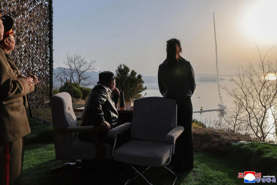 North Korean leader Kim Jong Un and his daughter inspecting the test-fire of a ballistic missile at an undisclosed location in North Korea on April 19.