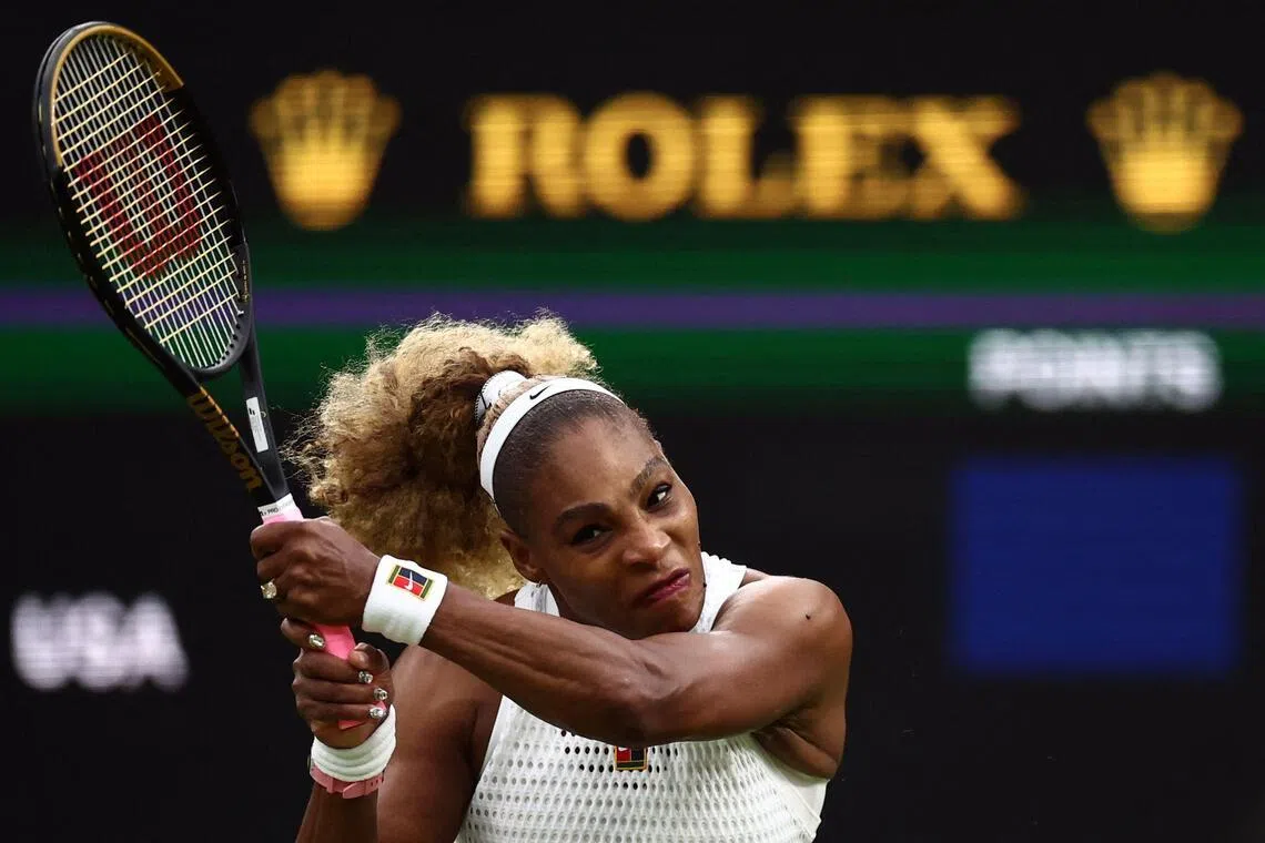 US player Serena Williams returns the ball to Australia's Maya Joint during their women's singles first round tennis match on the second day of the 2026 Wimbledon Championships at The All England Lawn Tennis and Croquet Club in Wimbledon, southwest London, on June 30, 2026. (Photo by HENRY NICHOLLS / AFP) / RESTRICTED TO EDITORIAL USE
