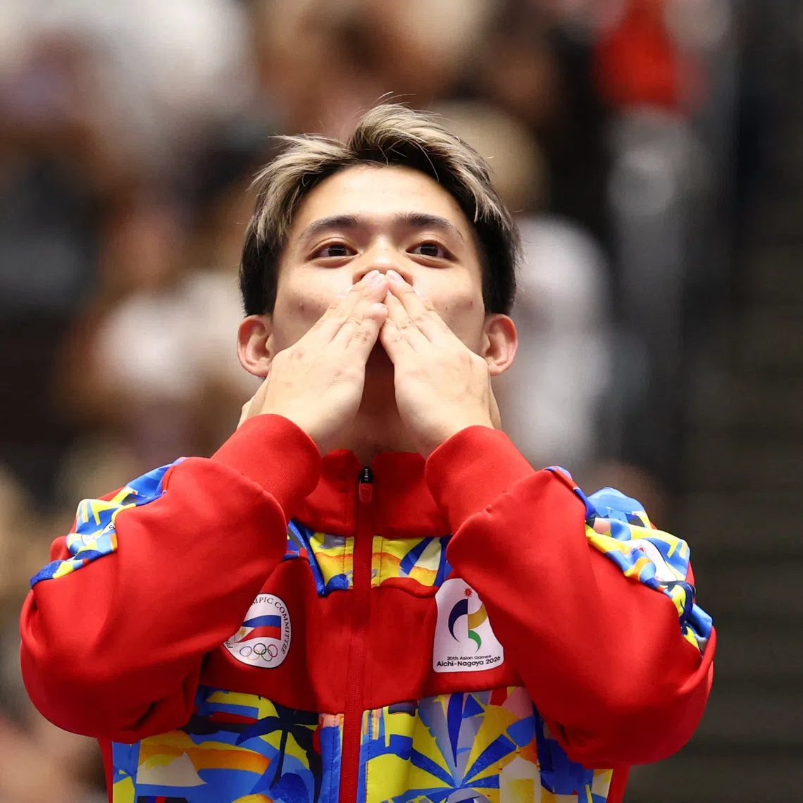 Filipino gymnast celebrates after winning the floor exercise gold at the ongoing Asian Games in Nagoya, Japan.