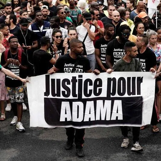 Protesters taking part in a march in Beaumont-sur-Oise on July 20, 2019, against police violence after the death of Adama Traore in police custody.