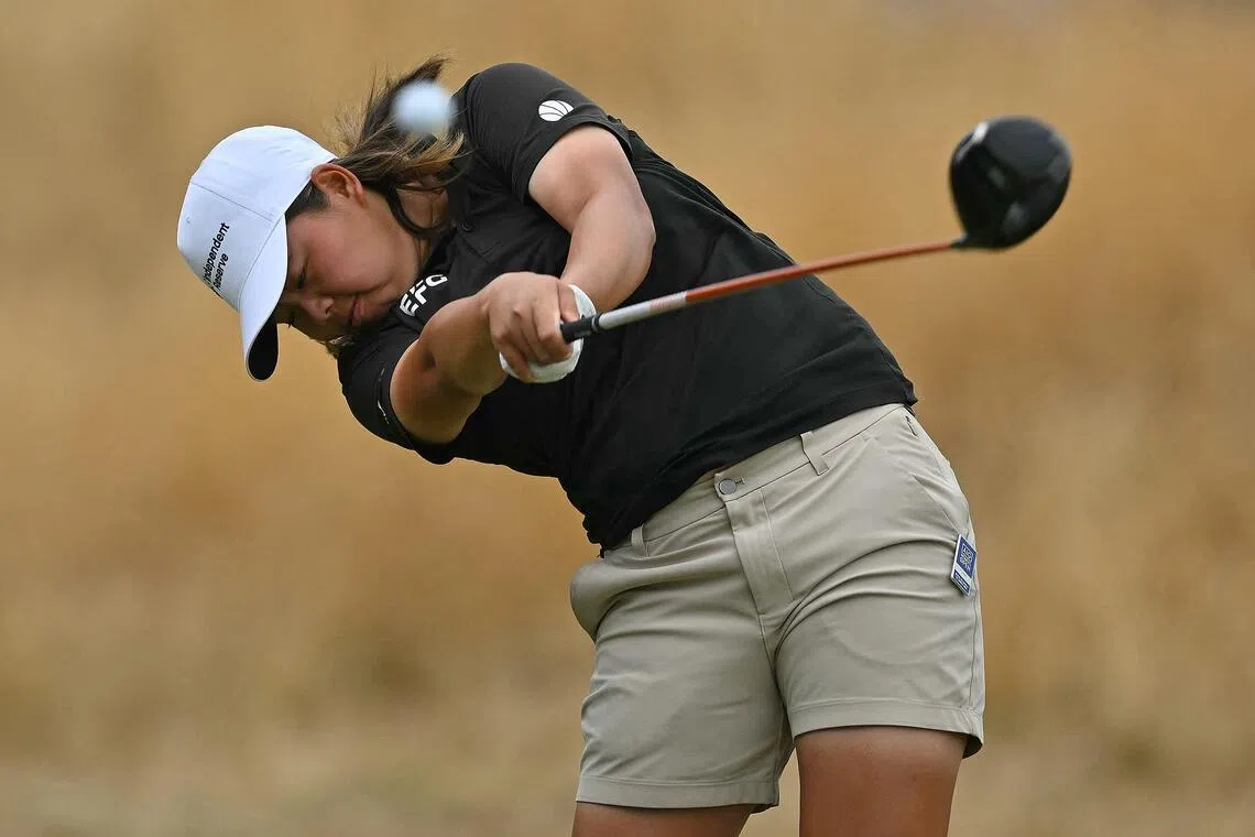 Singapore's Shannon Tan drives from the 3rd tee on the final day of the 2026 Women's British Open Golf Championships at Royal Lytham & St. Annes Golf Club, north-west England, on August 2, 2026. (Photo by Glyn KIRK / AFP) / RESTRICTED TO EDITORIAL USE