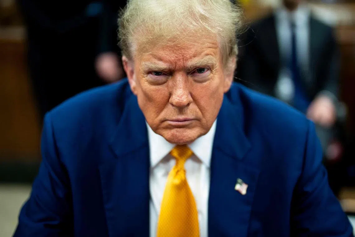 TOPSHOT - Former US President and Republican presidential candidate Donald Trump awaits the start of proceedings in his criminal trial at Manhattan Criminal Court in New York City, on May 2, 2024. Trump, 77, is accused of falsifying business records to reimburse his lawyer, Michael Cohen, for a $130,000 hush money payment made to porn star Stormy Daniels just days ahead of the 2016 election against Hillary Clinton. (Photo by Doug Mills / POOL / AFP)