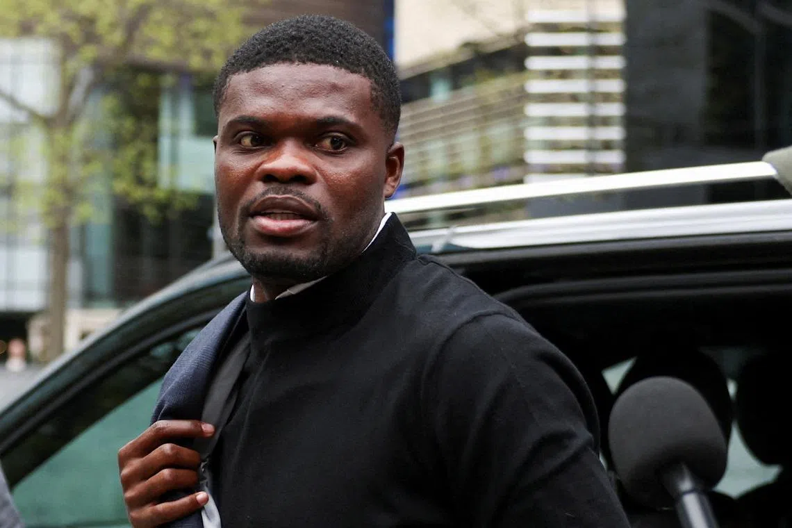 Ghana national team and Villarreal midfielder Thomas Partey, who is facing two additional counts of rape and has pleaded not guilty to five counts of rape and one count of sexual assault, walks outside Southwark Crown Court in London, Britain, April 13, 2026. REUTERS/Hannah McKay