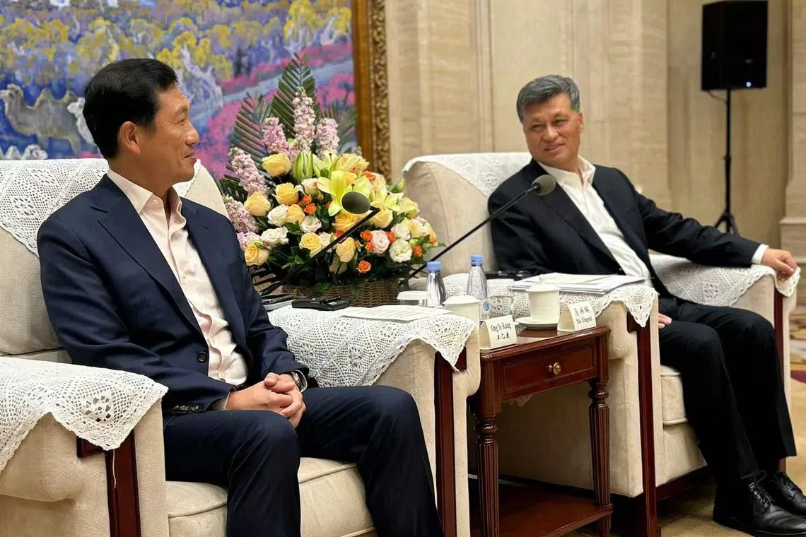 Health Minister Ong Ye Kung (left) is on a visit to Xinjiang at the invitation of the region’s leader Ma Xingrui.