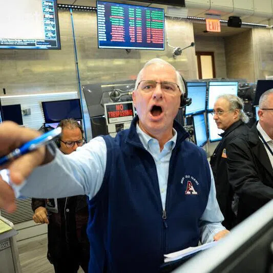 Futures-options traders work on the floor at the New York Stock Exchange's NYSE American (AMEX) in New York City. 