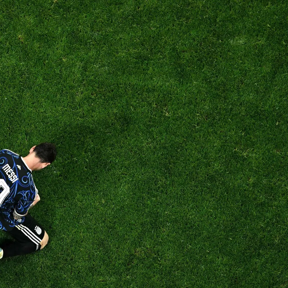 Argentina’s Lionel Messi celebrates after reaching the World Cup final.
