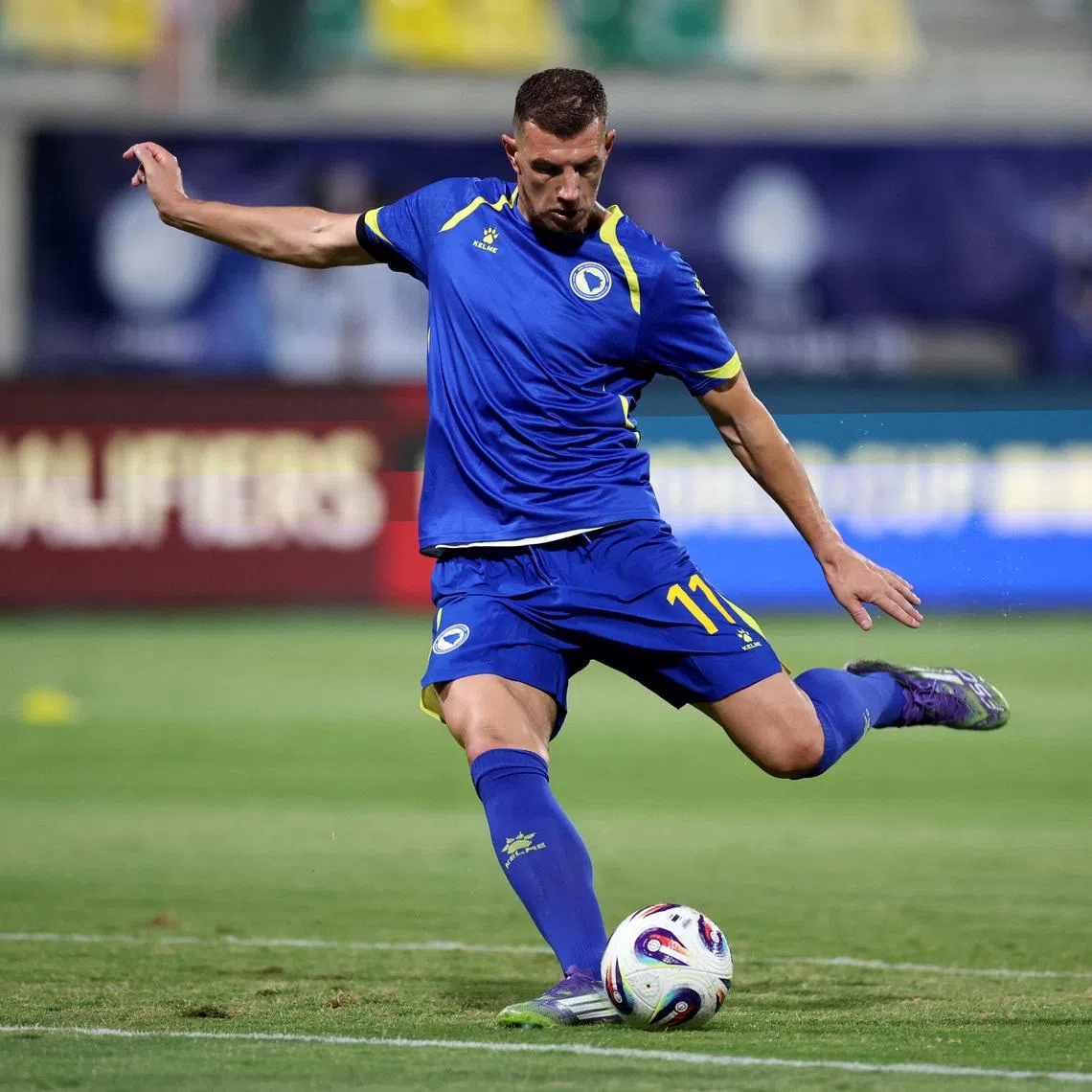 Soccer Football - FIFA World Cup - UEFA Qualifiers - Group H - Cyprus v Bosnia and Herzegovina - AEK Arena, Larnaca, Cyprus - October 9, 2025 Bosnia and Herzegovina's Edin Dzeko during the warm up before the match REUTERS/Yiannis Kourtoglou/File Photo
