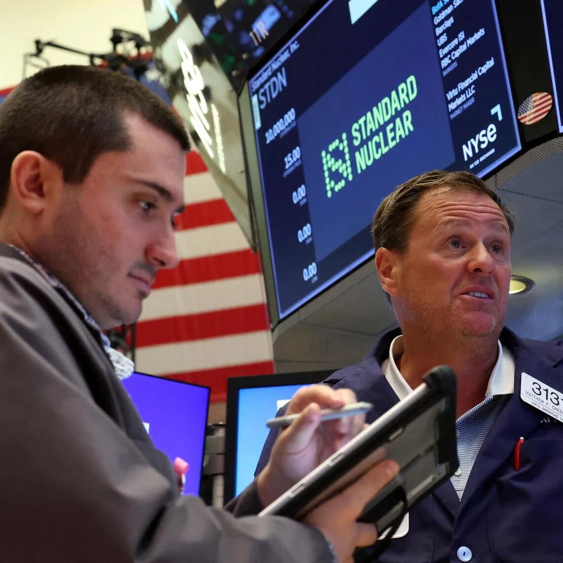 Traders working on the floor of the New York Stock Exchange, in New York City, on July 16.