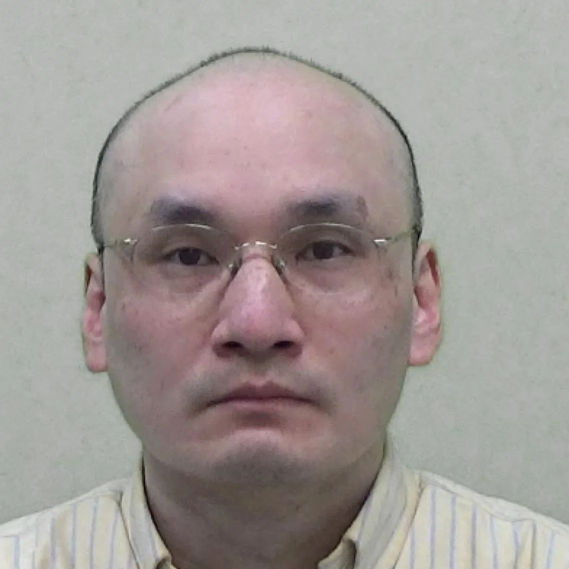 Thomas Kwan, 53, a British doctor who pleaded guilty to the attempted murder of his mother's partner, Patrick O'Hara, with a fake COVID-19 vaccine, is seen in this undated handout image obtained by Reuters on October 7, 2024.  Northumbria Police/Handout via REUTERS/File Photo
