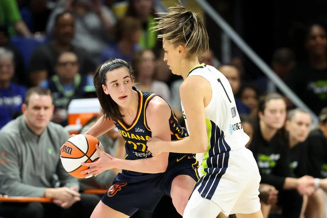 Indiana Fever guard Caitlin Clark (22) scored 21 points in the pre-season game against Dallas Wings on May 3.