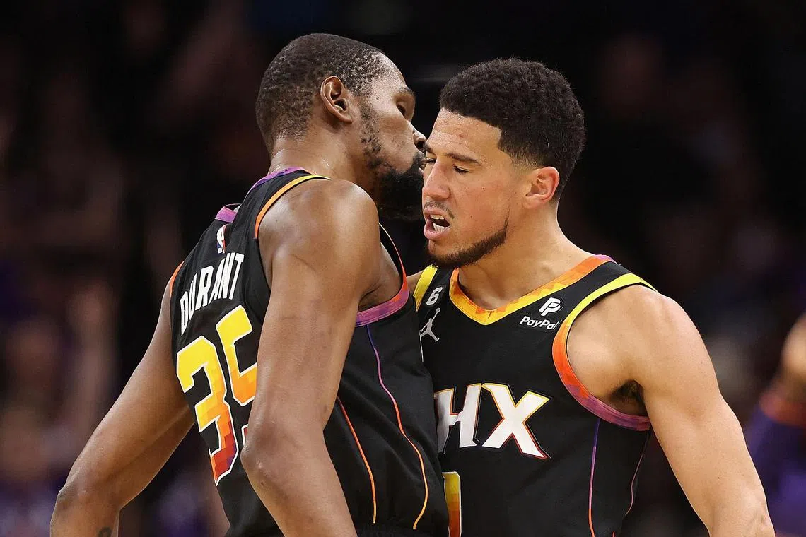 The Phoenix Suns' Kevin Durant (left) and Devin Booker scored a combined 86 points.