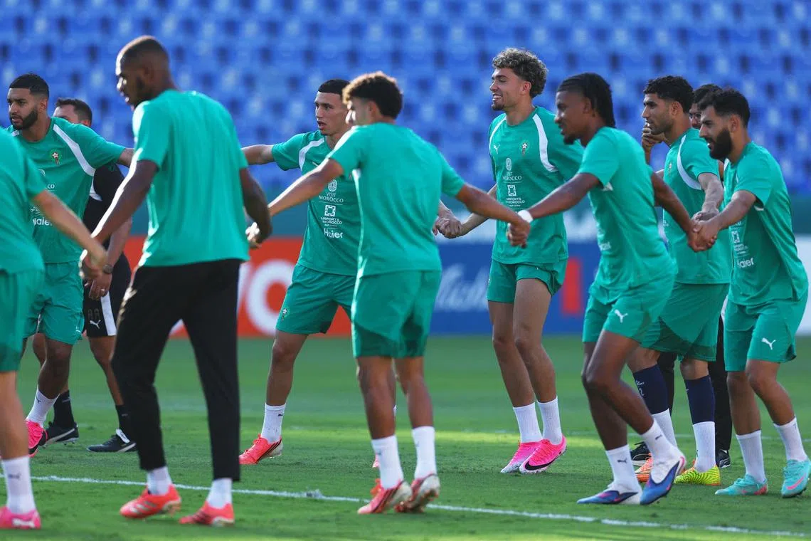 Soccer Football - FIFA World Cup 2026 - Morocco Training - Estadio Universitario, Monterrey, Mexico - June 27, 2026 Morocco's Achraf Hakimi, Bilal El Khannouss and Ismael Saibari with teammates during training REUTERS/Daniel Becerril