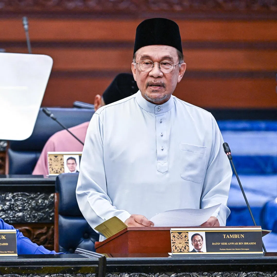 Malaysian Prime Minister Anwar Ibrahim delivering the country's 2026 budget on Oct 10.