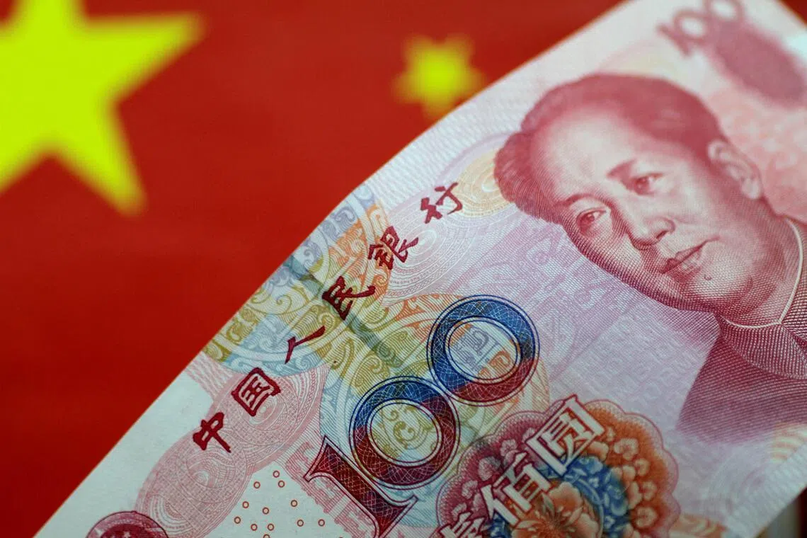 FILE PHOTO: A China yuan note is seen in this illustration photo May 31, 2017.     REUTERS/Thomas White/Illustration/File Photo
