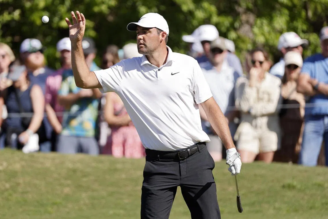 Scottie Scheffler of the United States catching his ball on the 16th green during day four of the World Golf Championship Matchplay event at Austin Country Club on Saturday  in Austin, Texas.