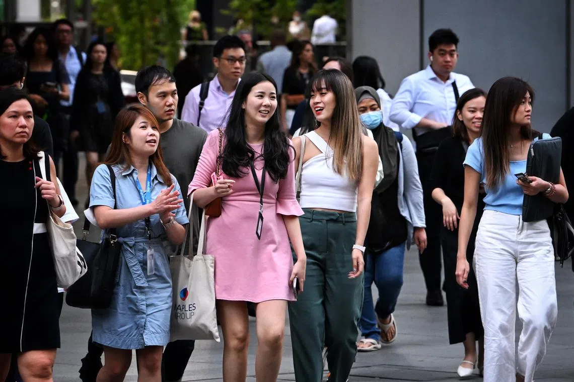 The law may pass, but workers and bosses are the key to cutting out workplace biases.

Generic photo of female office workers at Raffles Place after office hours on February 20, 2023. Can be used for woman, women workforce, labour, manpower, economy stories, population, youth