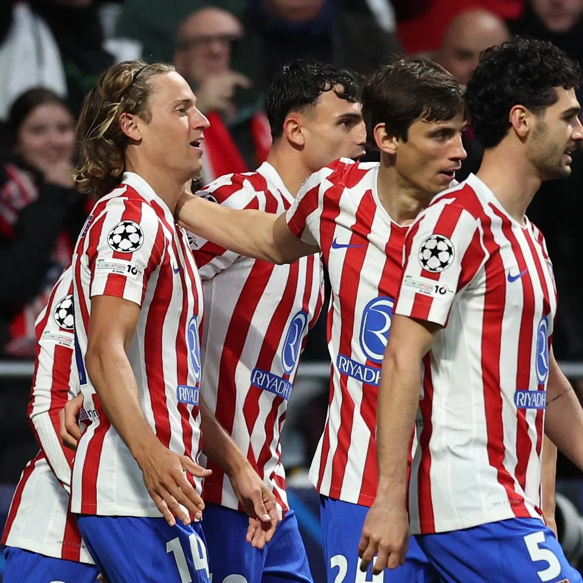 Soccer Football - UEFA Champions League - Round of 16 - First Leg - Atletico Madrid v Tottenham Hotspur - Riyadh Air Metropolitano, Madrid, Spain - March 10, 2026 Atletico Madrid's Marcos Llorente celebrates scoring their first goal with teammates REUTERS/Violeta Santos Moura