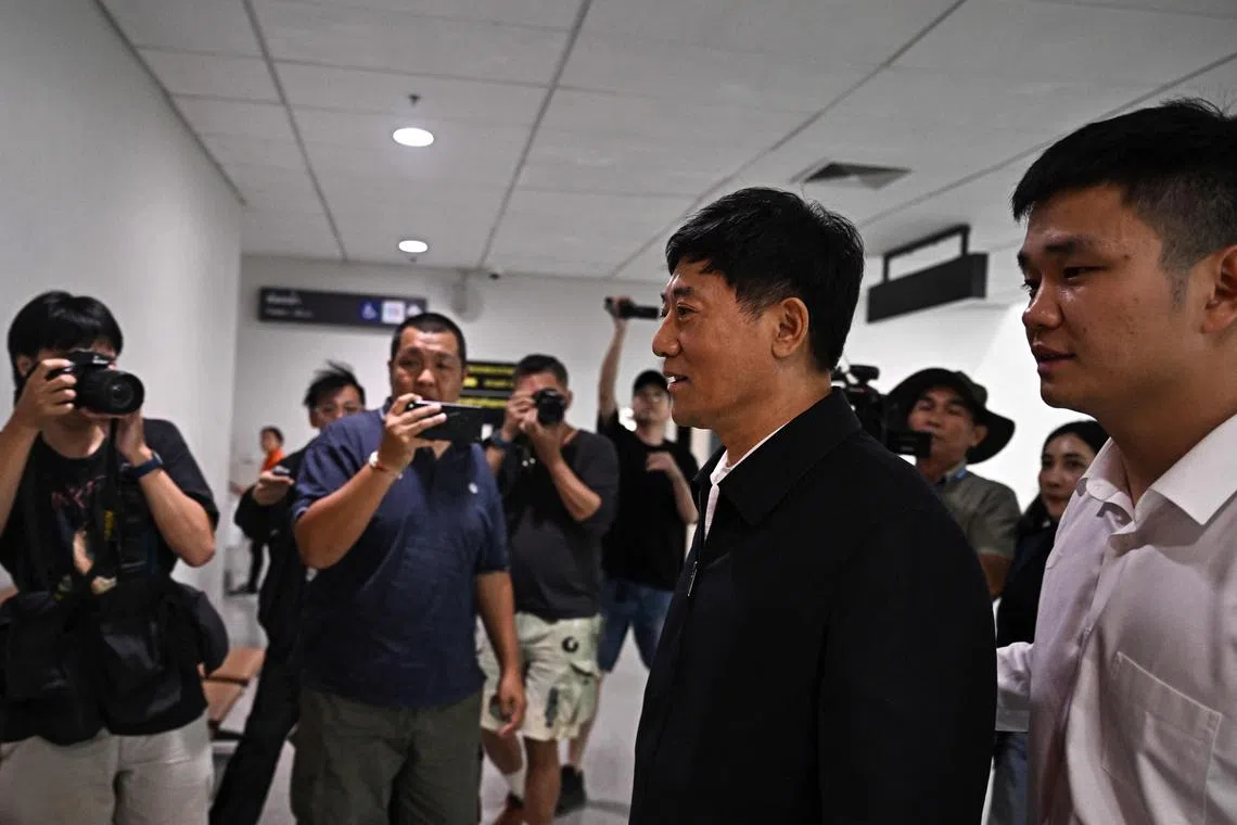 Chinese Public Security Assistant Minister Liu Zhongyi (2R) is seen at Mae Sot International Airport in Tak province on February 17, 2025, after visiting the Thai-Myanmar border as the three countries discuss returning people allegedly working at scam compounds in Myanmar's border towns. (Photo by Lillian SUWANRUMPHA / AFP)
