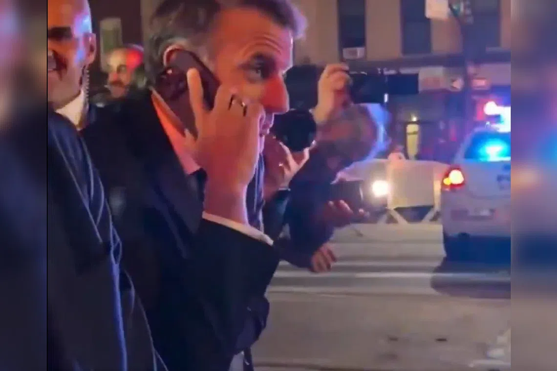French President Emmanuel Macron calling US President Donald Trump from the street in New York, in a video circulating online. 