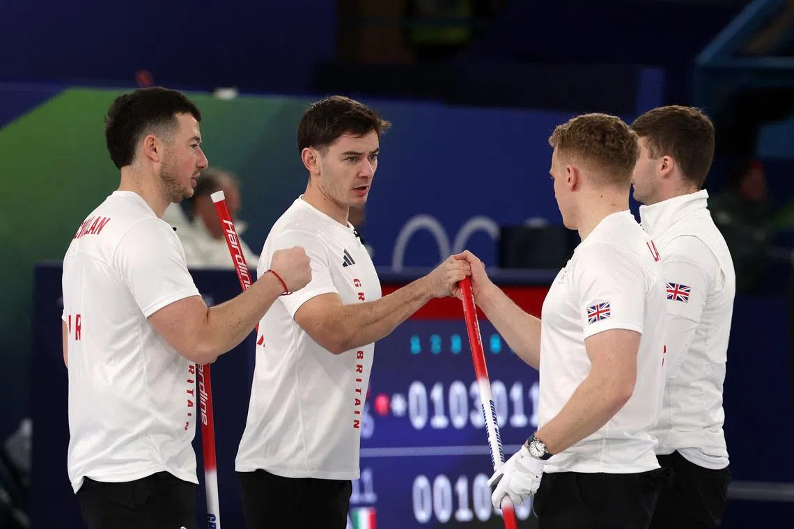 Curling-Perfect Swiss beat Britain to top men's standings