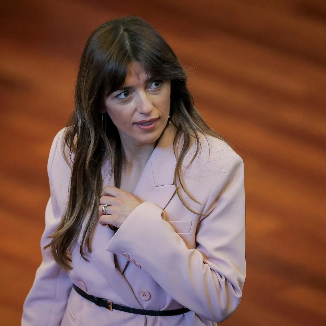 Albulena Haxhiu, nominee of the Self-Determination party for the speaker of the parliament, leaves the plenary session, in Pristina, Kosovo April 25, 2025. REUTERS/Valdrin Xhemaj