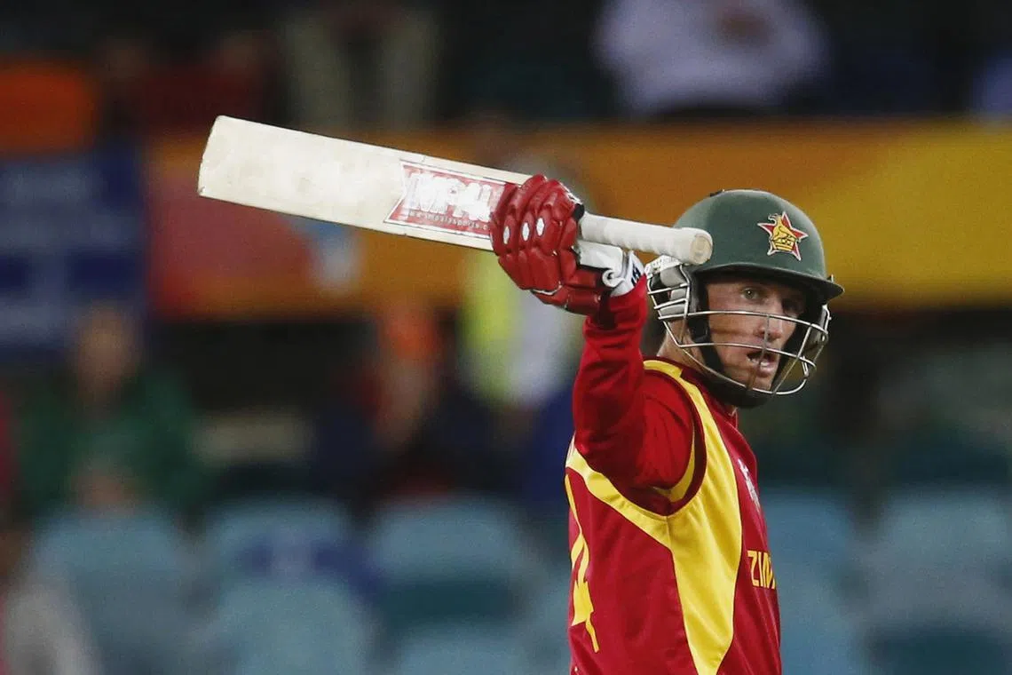 FILE PHOTO: Zimbabwe's batsman Sean Williams acknowledges his 50 runs during his World Cup Cricket match against the West Indies in Canberra, February 24, 2015. REUTERS/David Gray/File Photo