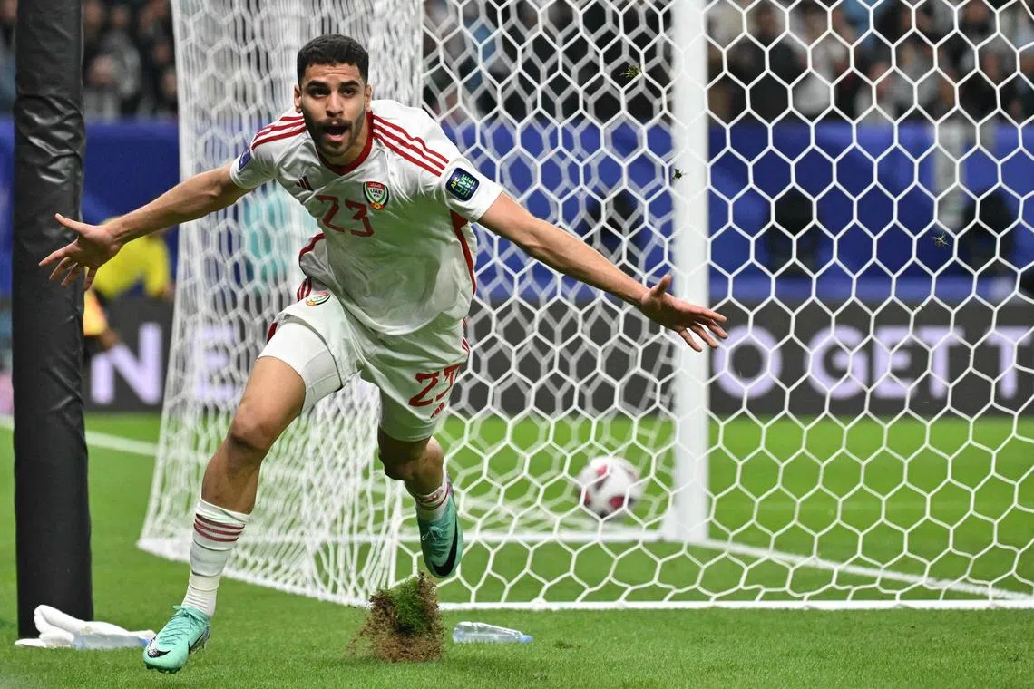 Forward Sultan Adil celebrates after scoring the opening goal for the UAE.