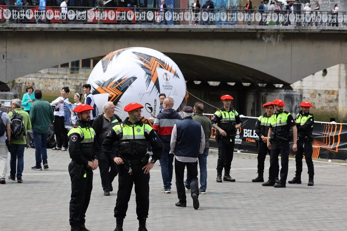 Soccer Football - Europa League - Final - Preview - Tottenham Hotspur v Manchester United - Bilbao, Spain - May 20, 2025 Police personnel stand guard in Bilbao ahead of the final REUTERS/Pankra Nieto