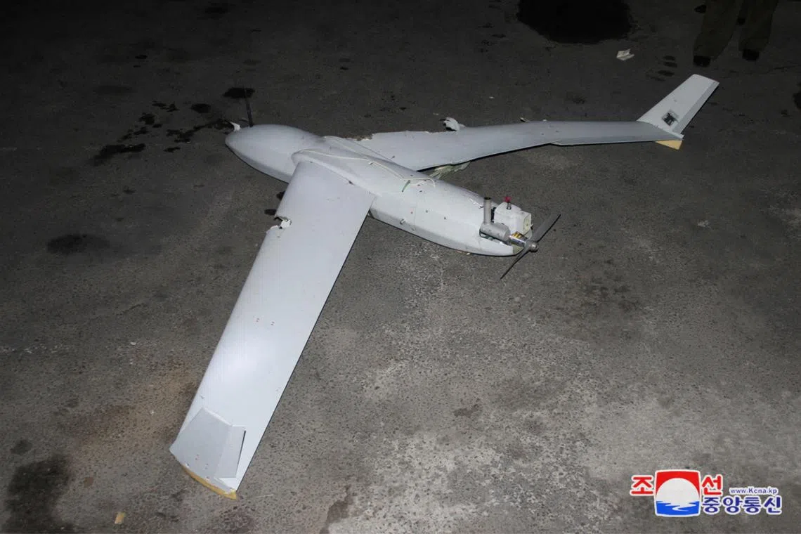 The remains of a crashed drone are shown in a photo released by North Korea's official Korean Central News Agency on Oct 19.