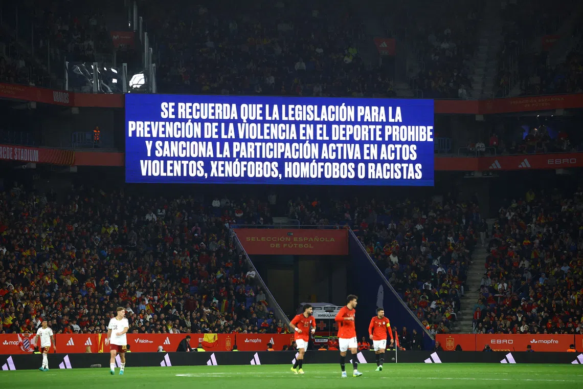 FILE PHOTO: Soccer Football - International Friendly - Spain v Egypt - RCDE Stadium, Cornella de Llobregat, Spain - March 31, 2026 A big screen displays an anti discrimination message inside the stadium during the match REUTERS/Albert Gea/File Photo