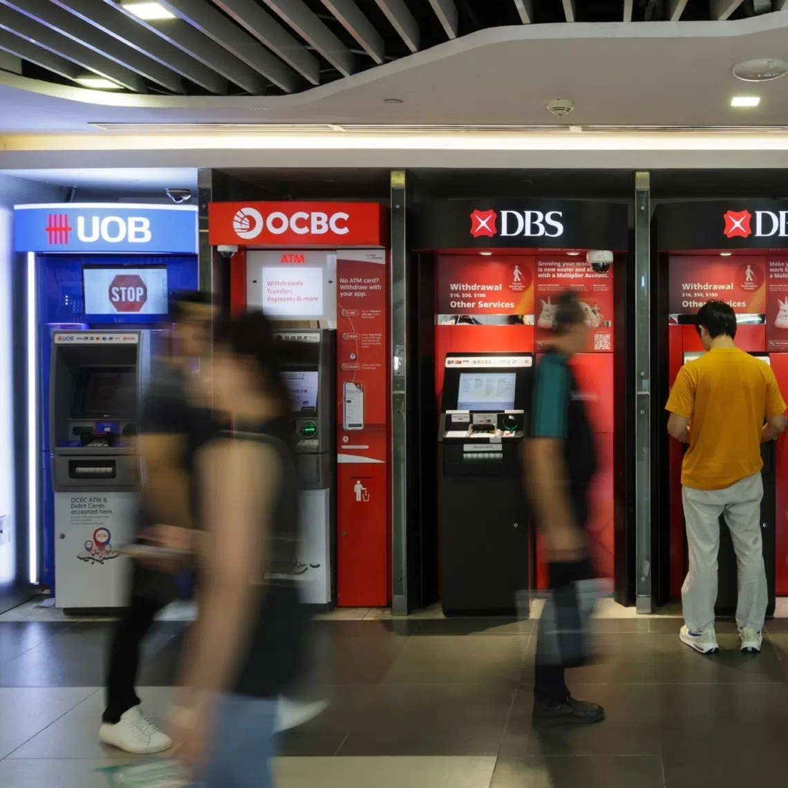A man using the DBS ATM at Bugis Junction on Oct 2.