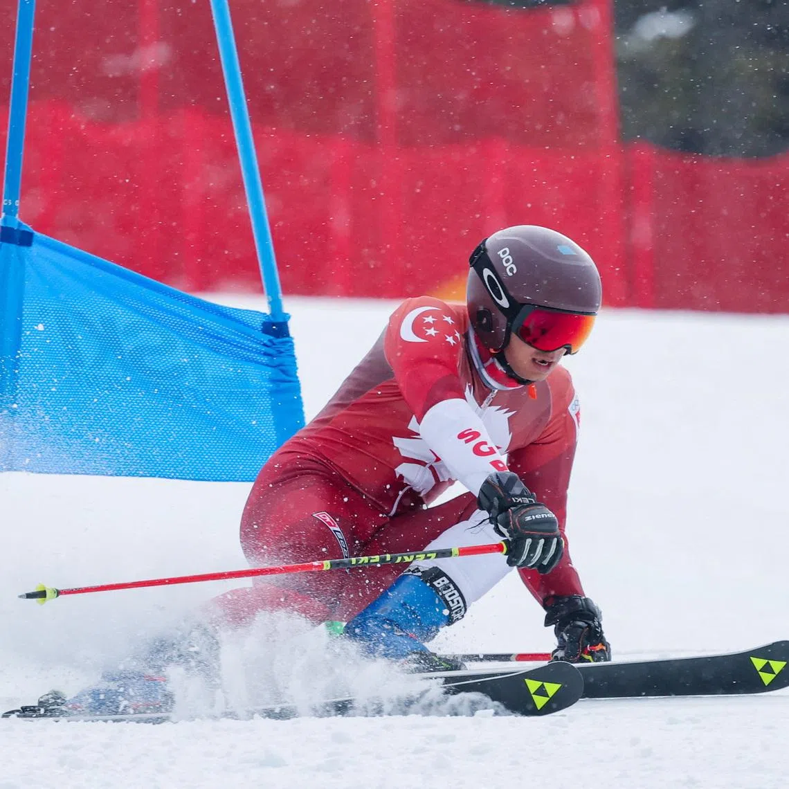 Singaporean skier Faiz Basha clears a gate during a training session ahead of the alpine skiing race at the Milano Cortina 2026 Winter Olympics, in Bormio, Italy, February 10, 2026. REUTERS/Denis Balibouse