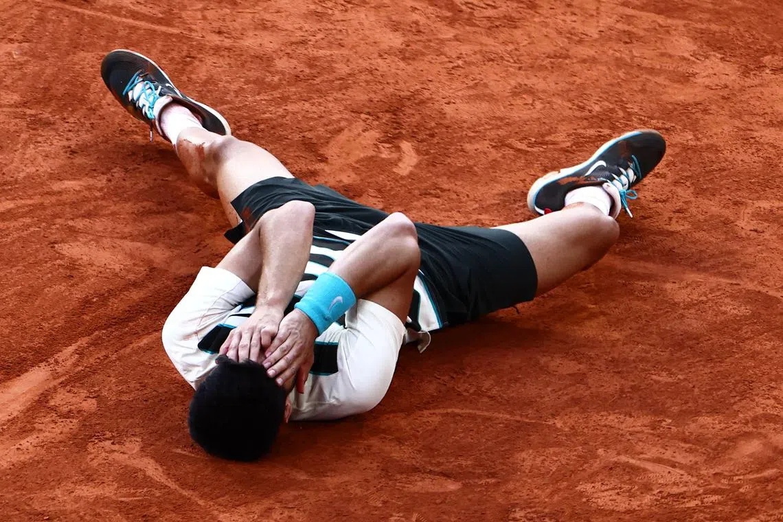 Spain's Carlos Alcaraz celebrating after winning against Italy's Jannik Sinner at the end of their men's singles final match of the French Open tennis tournament on Court Philippe-Chatrier, held at the Roland-Garros Complex in Paris, on June 8, 2025. 