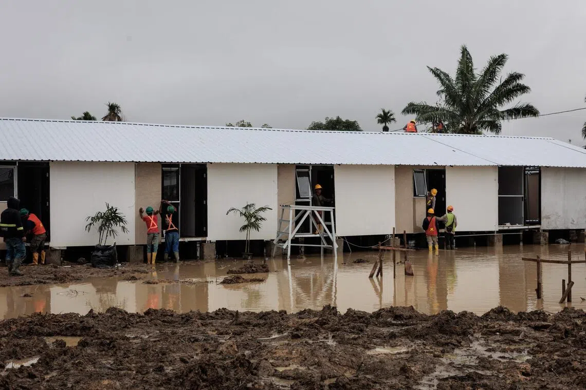 Indonesia sues firms over environmental harm in flood zone