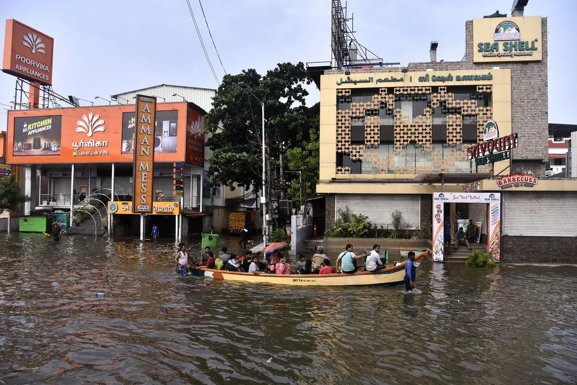 Residents being evacuated after a heavy downpour brought about by Cyclone Michaung in Chennai on Dec 6, 2023.