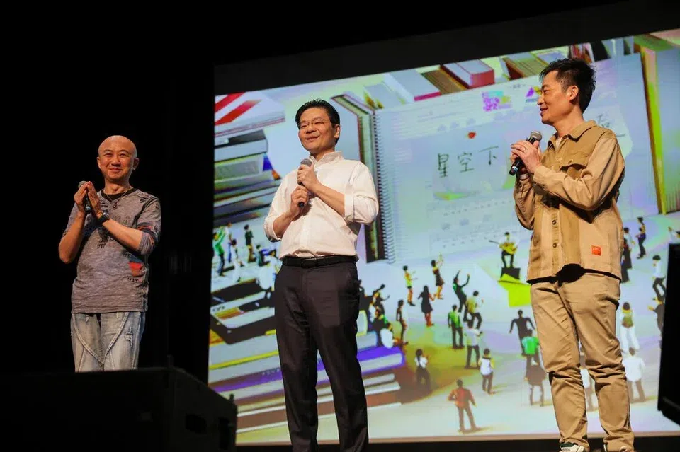 (From left) Veteran music producer Billy Koh, Prime Minister Lawrence Wong; and acclaimed singer-songwriter Liang Wern Fook; at the premiere of 'Tuesday Report: Encounter Under The Stars' at Singapore Chinese Cultural Centre on March 30.