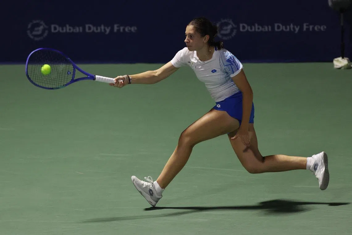 Tennis - WTA 1000 - Dubai Championships - Dubai Tennis Stadium, Dubai, United Arab Emirates - February 16, 2026 Croatia's Antonia Ruzic in action during her round of 64 match against Britain's Emma Raducanu REUTERS/Amr Alfiky