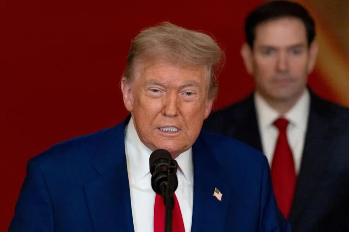 US President Donald Trump (left) and US secretary of state Marco Rubio during an address to the nation at the White House on June 21.