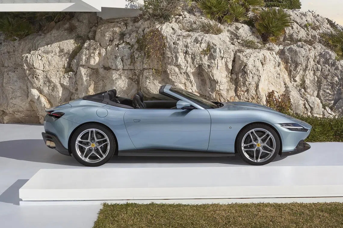 The Ferrari Roma Spider's motorised fabric roof can flip open in 13.5 seconds.