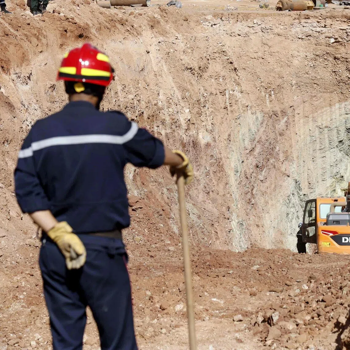 Rescuers working to reach 10-year-old Ayoub on Sept 5, after he fell into an 80m-deep well near his home in Algeria. The traditionally dug well was just 40cm in diameter, making efforts to rescue him difficult.