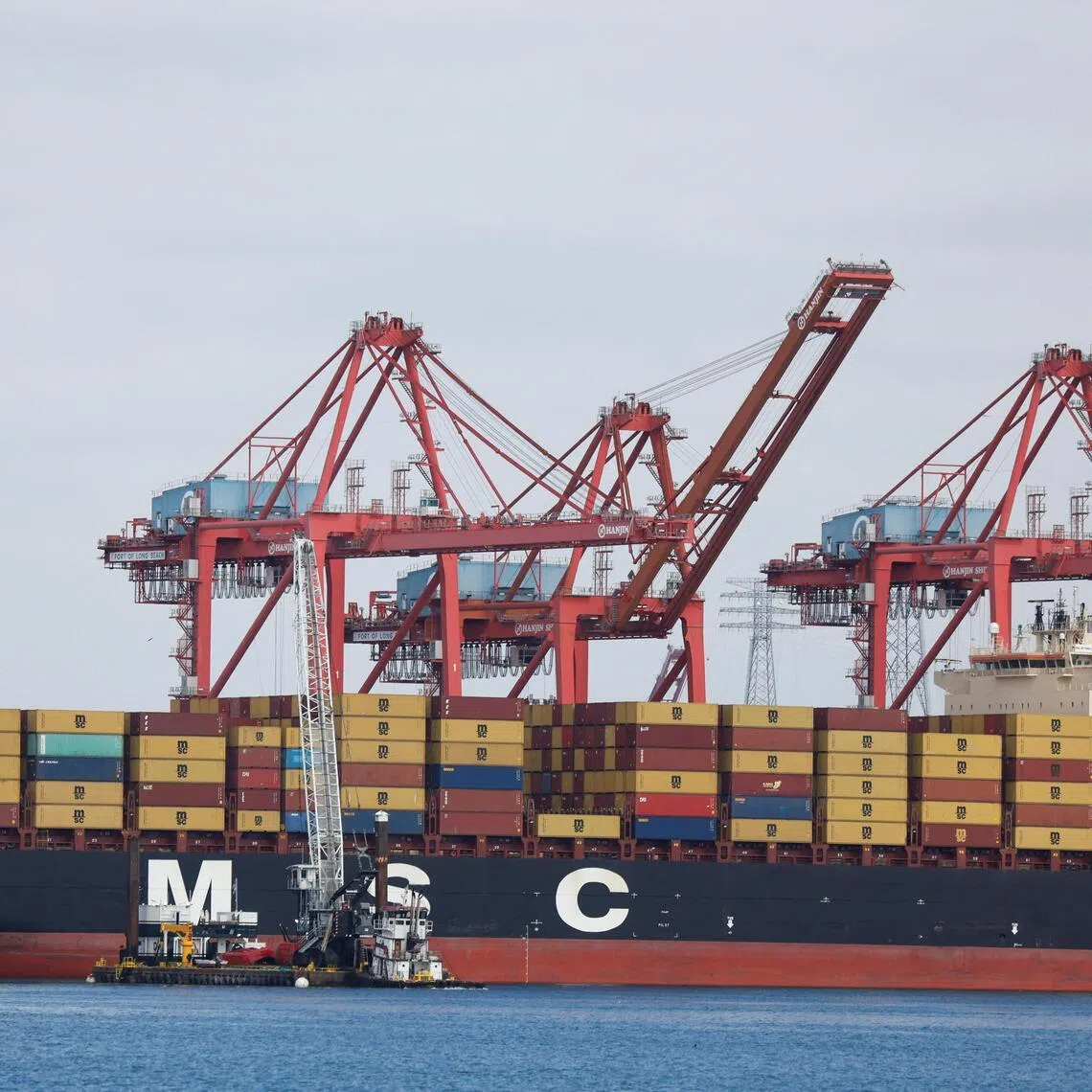 Shipping containers sit on a Mediterranean Shipping Company vessel docked at the port of Los Angeles in Long Beach, California, on March 10, 2026.